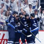 Jets rally to beat Blues, Avs steamroll Stars in NHL playoff openers
