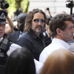 Russell Brand arrives at London court to face sexual assault charges